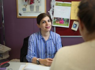 People at a desk for casework support
