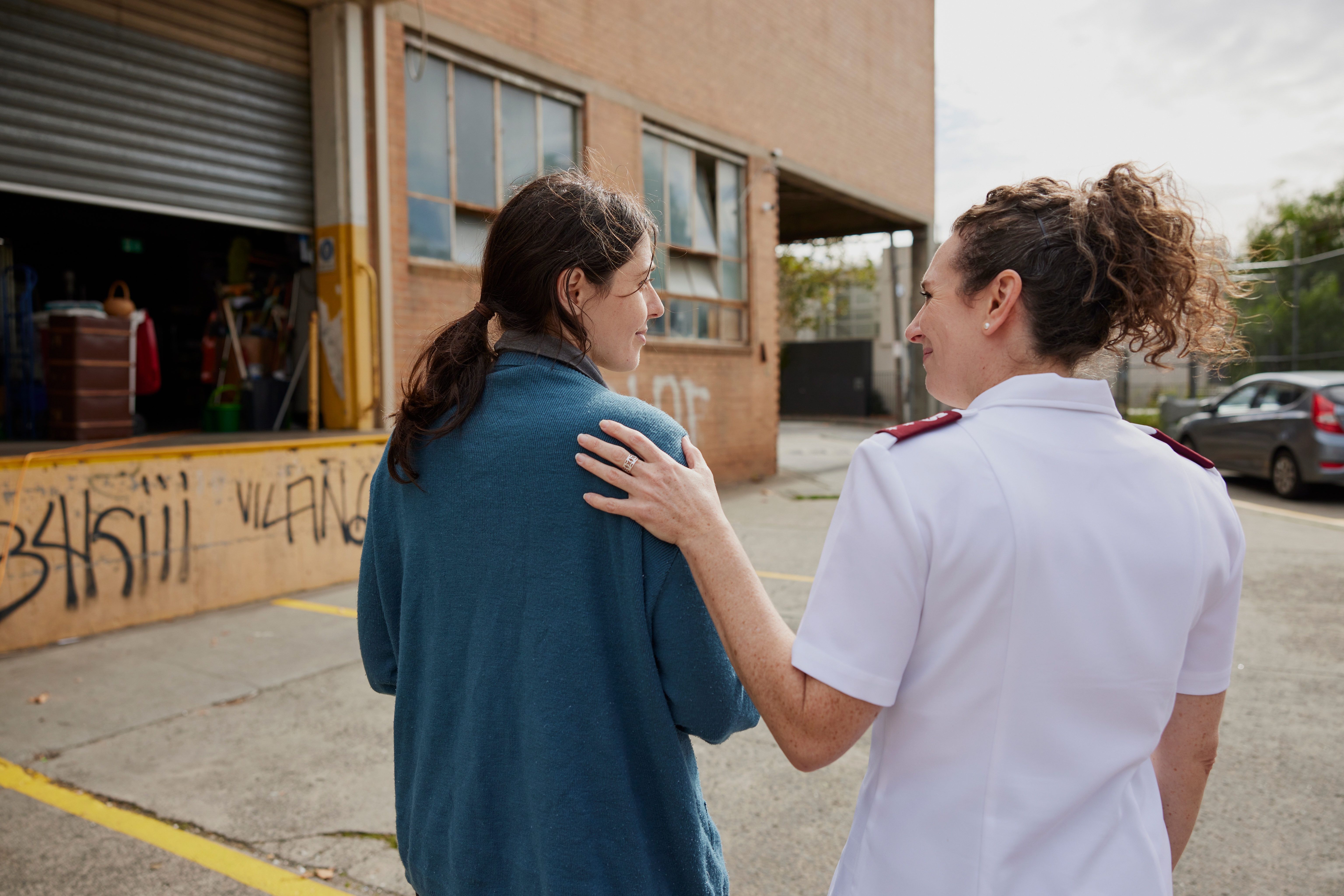 Salvos officer assisting a women experiencing financial hardship